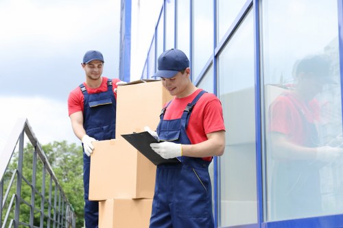 Moving professionals protecting furniture during a Bayswater relocation
