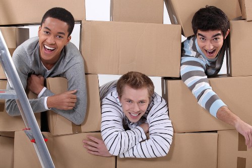 Staff preparing workstations for a Bayswater commercial move