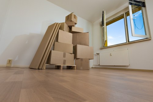Home moving boxes and packed belongings in a Bayswater property