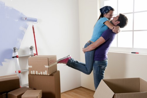 Staff completing a risk assessment for a removal job